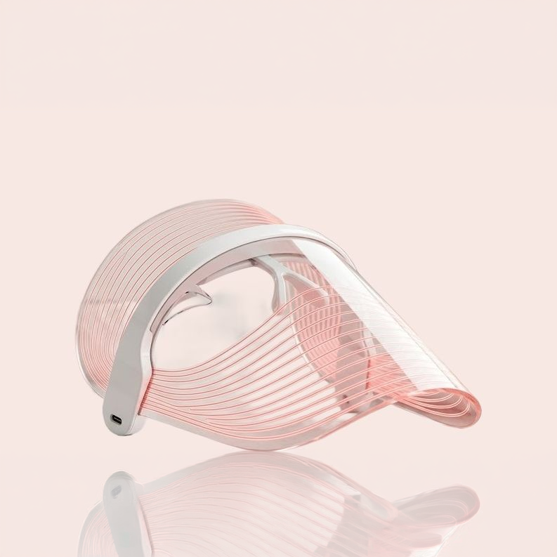Zivora LED 7-Color Light Therapy Face Mask on blush background